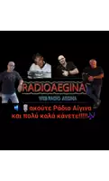 a group of men standing in front of a sign that says " radioaegina "