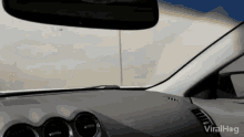 the dashboard of a car is shown with the words viralhog at the bottom