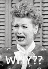 a black and white photo of a woman making a funny face with the word why written below her