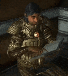a man in armor is reading a book with a pendant on his chest