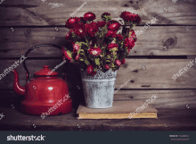 Rustic Tin Can Tea Pot GIF - Rustic Tin Can Tea Pot Flowers GIFs