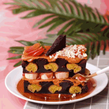 a white plate topped with a slice of banana brownie