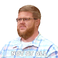 a man with glasses and a beard has the words not at all on his shirt
