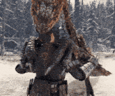 a person in armor is standing next to a dragon