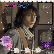 a picture of a young man with flowers and butterflies and the words good night