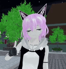 a girl with pink hair and cat ears gives a thumbs up
