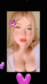 a woman with a flower on her forehead and a pink heart