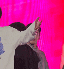a man wearing a hoodie that says ' nct ' on it