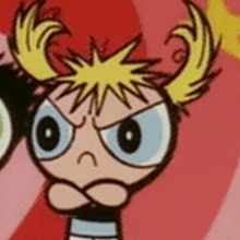 a close up of a cartoon character with a very angry face .