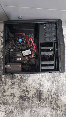 the inside of a computer case has a power supply that says evga on it