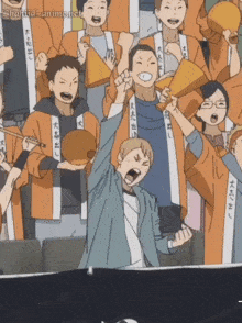 a group of people wearing orange shirts with chinese characters on them