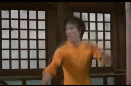 Bruce Lee Nunchaku GIF - Bruce Lee Nunchaku Fight - Discover & Share GIFs