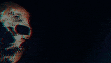 a glowing skull with a dark background