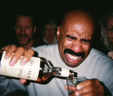 a man with a mustache is pouring a drink from a bottle that says ' sherry ' on it
