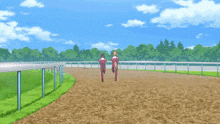 a couple of people walking on a dirt road