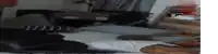 a man is laying on his back on the floor in a room .