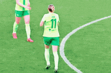 a soccer player with the number 11 on their jersey