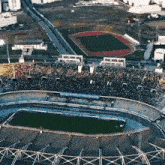 an aerial view of a soccer stadium with a sign that says ' allianz ' on it