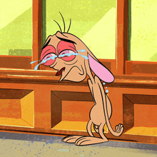a cartoon character with tears running down his eyes