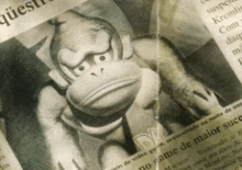 a newspaper with a picture of donkey kong on the front