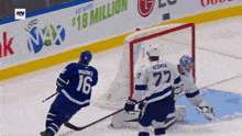 a hockey player with the number 16 on his shirt