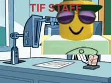 a cartoon character is sitting at a desk with the words tif staff below him