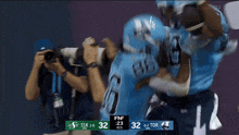 a football game is underway and the score is 32 to 2
