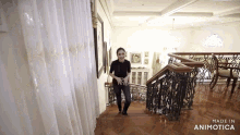 a woman is walking up a set of stairs made by animatica