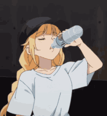 a girl is drinking water from a bottle that says sprite on it