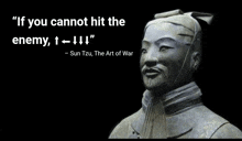 a statue with a quote from sun tzu on it