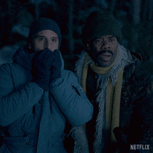 two men standing next to each other with netflix written on the bottom right