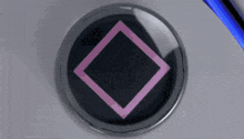 a close up of a playstation controller with a square triangle and v buttons