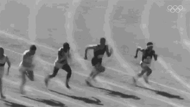 A group of athletes competing in a 100 meter race