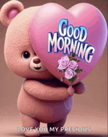 a teddy bear holding a heart shaped balloon with the words good morning on it