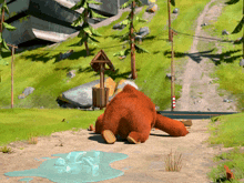 a cartoon bear is laying on the ground near a puddle of ice