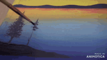 a painting of a lake is being painted with the words made in animotica below it