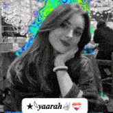 a black and white photo of a woman with the name yaarah on the bottom