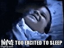 a child is laying in bed with a thermometer in his mouth and the words `` too excited to sleep '' above him .