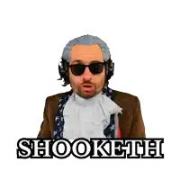 a man wearing headphones and sunglasses has the word shookette written on his face