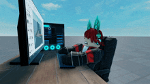 a cartoon character sits in front of a computer monitor