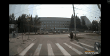 a screenshot of a crosswalk with a sign that says a on it