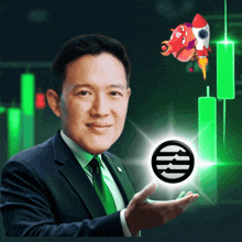 a man in a suit and tie is holding a coin with the letter r in it