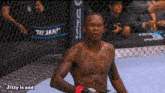 a man in a boxing ring with the words jizzy is sad below him