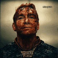 a man with blood on his face and the word miraj gifs below