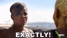 a woman is talking to another woman and the words exactly are on the screen