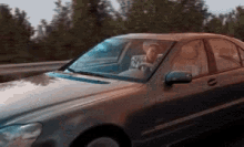 Miley Driving GIF