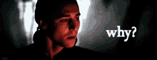 a man in a dark room is asking the question why ?