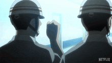 two men wearing helmets are looking out a window with netflix written on the bottom right