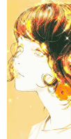 a close up of a woman 's face with a flower in her hair