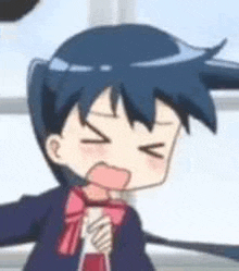 a close up of a cartoon character making a funny face with her eyes closed .